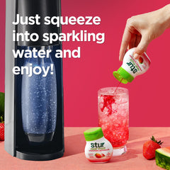 Stur Soda Machine pour drink demonstrates quick, convenient flavoring in water.