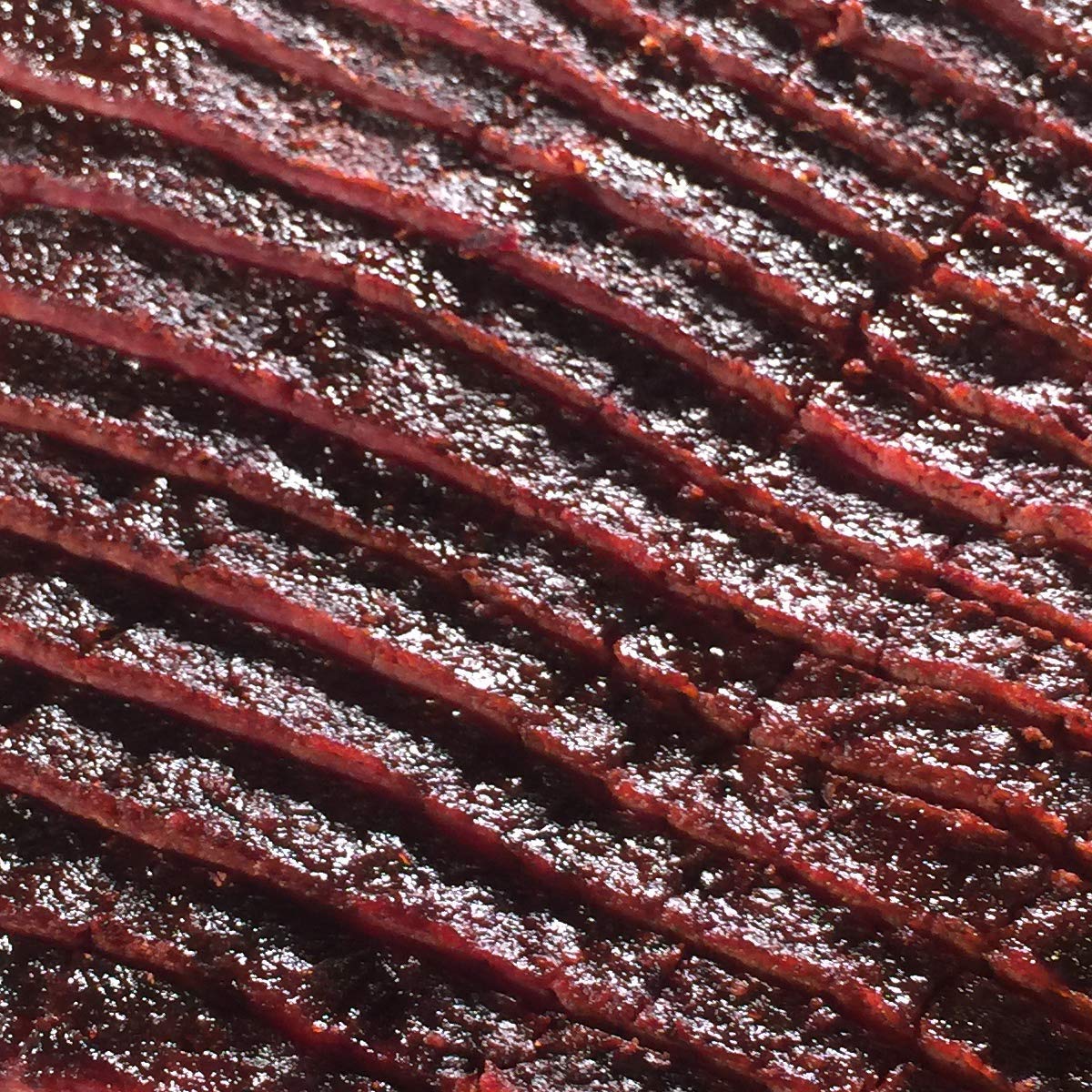 SuckleBusters 1836 Beef Rub on steak for bold pepper crust