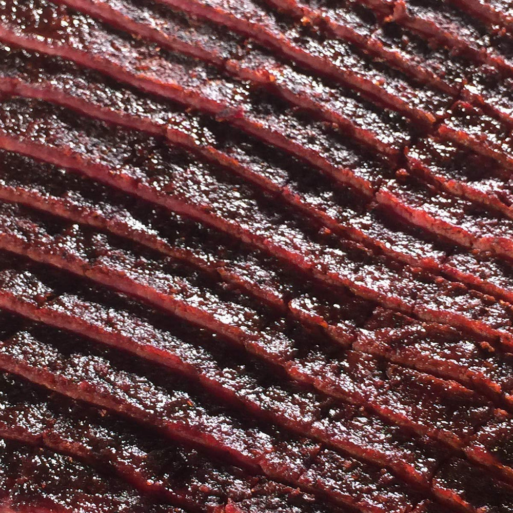 SuckleBusters 1836 Beef Rub on steak for bold pepper crust