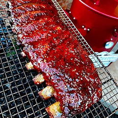 SuckleBusters Hog Waller on pork ribs offering sweet-salty crust