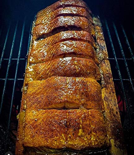 Grill ready pork and chicken seasoned with SuckleBusters Honey BBQ Rub