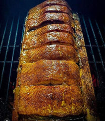 Grill ready pork and chicken seasoned with SuckleBusters Honey BBQ Rub