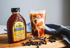 Sue Bee golden honey drizzle inviting topping on yogurt or toast