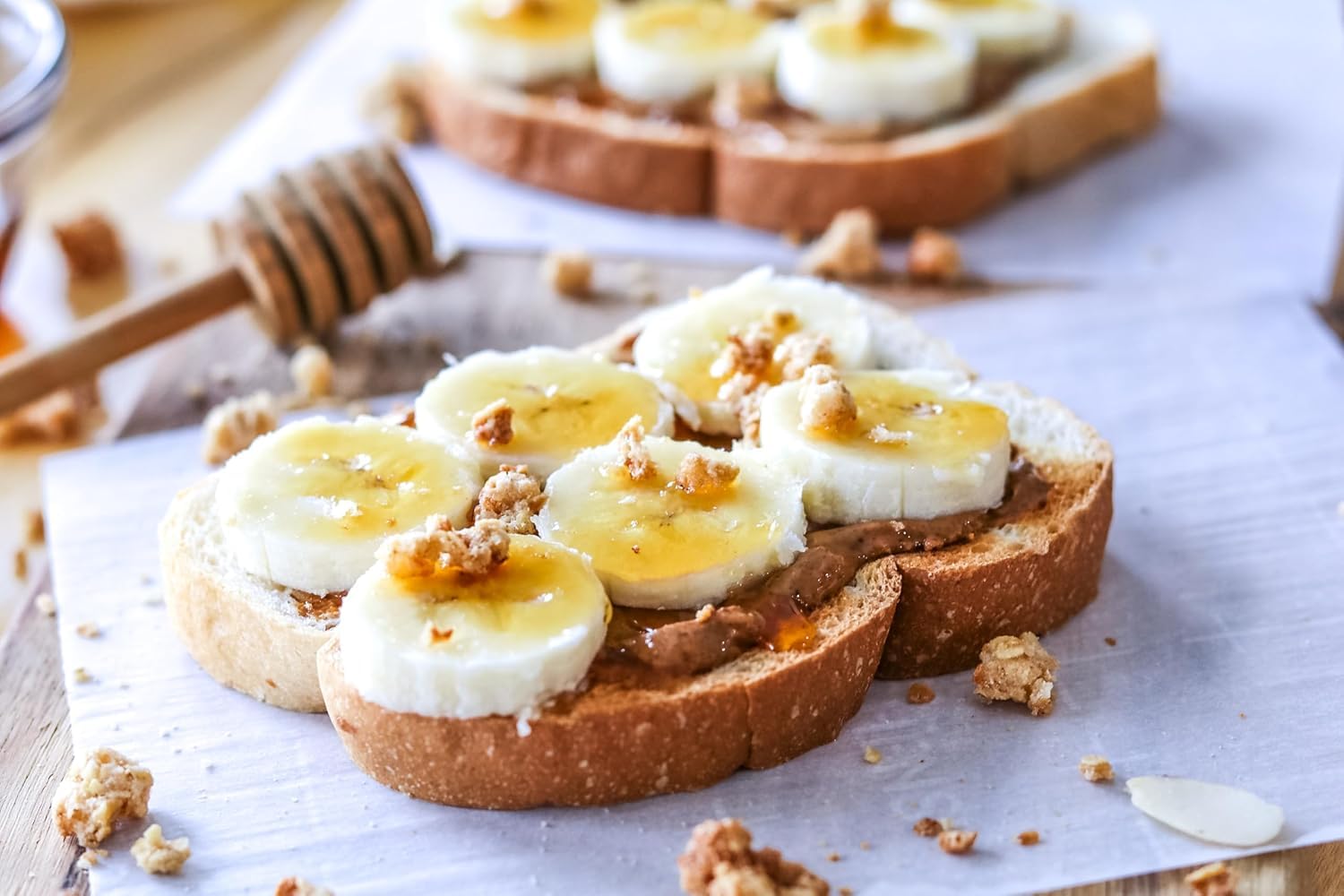 Sue Bee honey drizzle on spoon; elevates breakfast and tea.