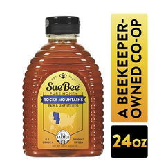 Sue Bee honey being poured, emphasizing raw unfiltered sweetness for tea