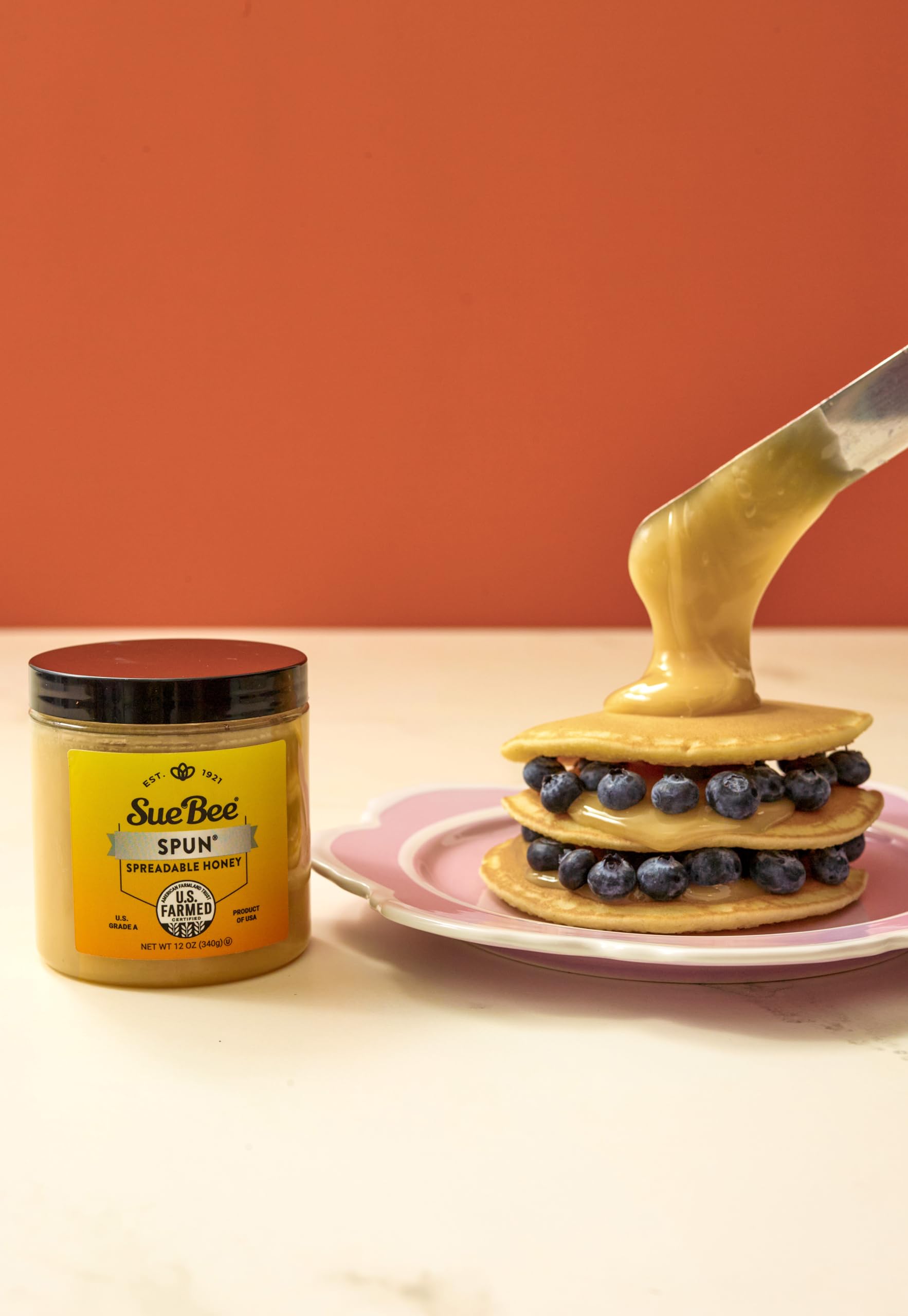 Sue Bee Premium Spun Honey toast setup, smooth and inviting on breakfast plates.