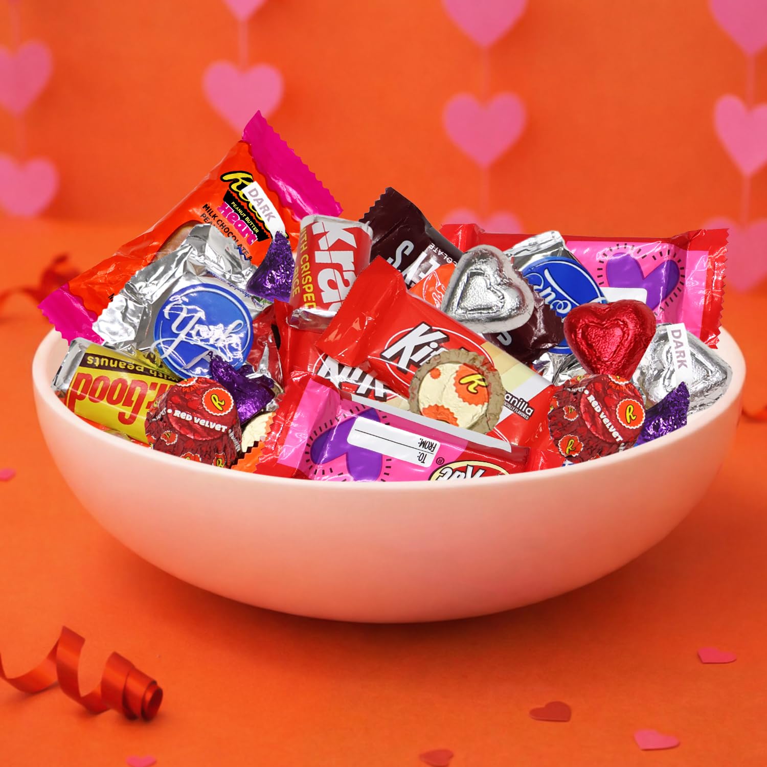 Valentine-themed wrappers add seasonal appeal for gift bags and event tables