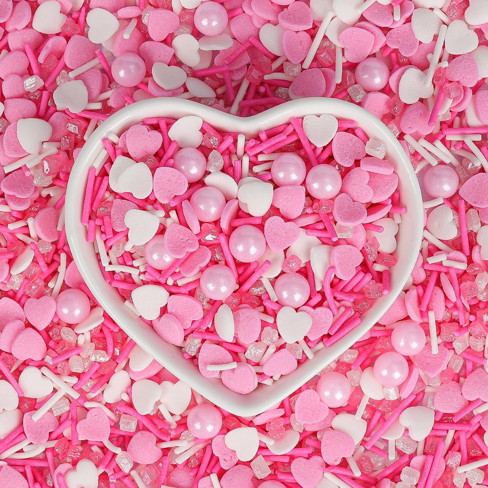 Sugarzy heart-shaped sprinkles enhance wedding and party desserts.