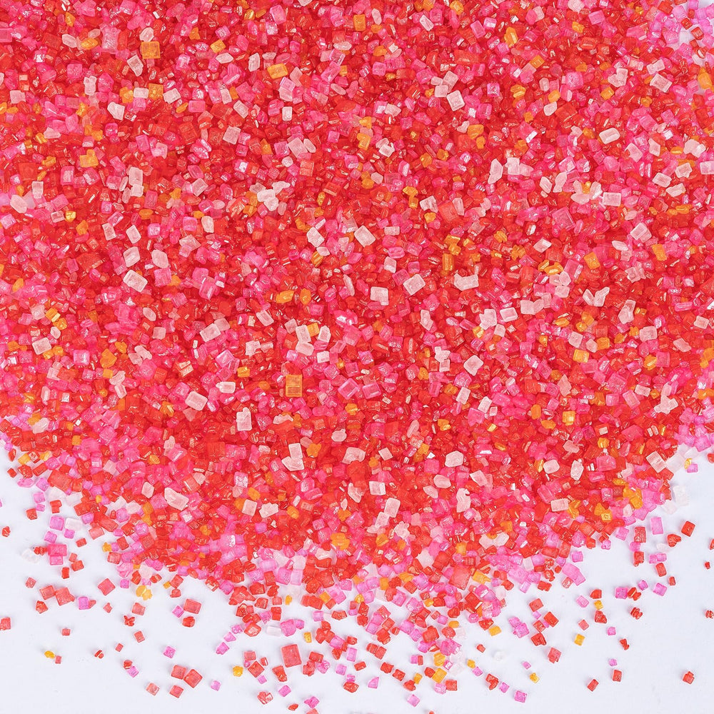 Sugarzy edible sanding sugar mix in gold, red, pink, and white for sparkling cake decorations.