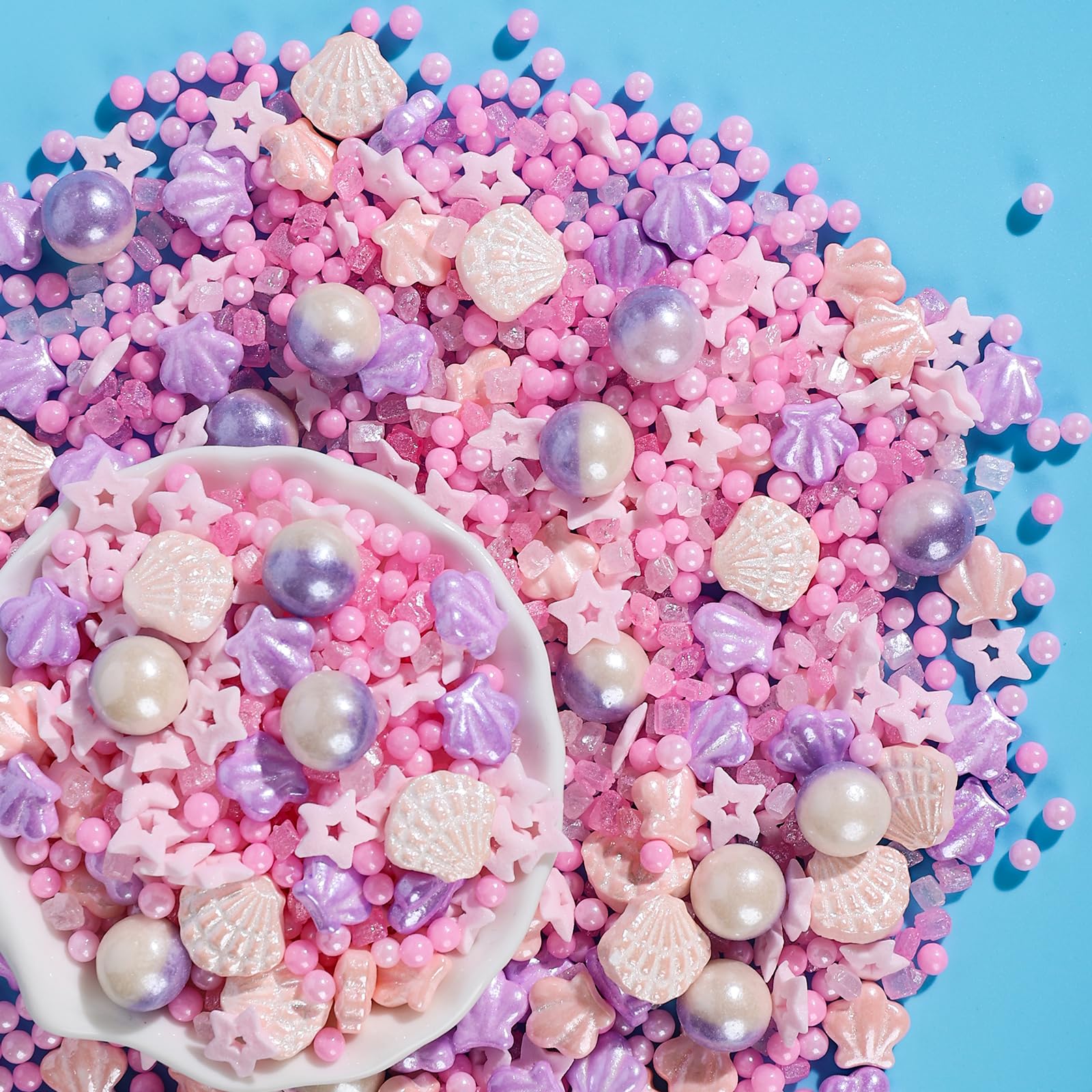 Sugarzy edible seashell sprinkles bottle for cake decoration and beachy vibes.