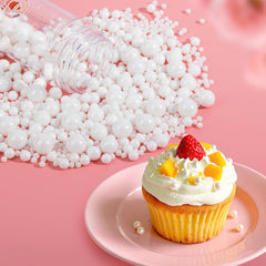 Sugarzy five-sizes white beads in bowl for versatile dessert decoration.