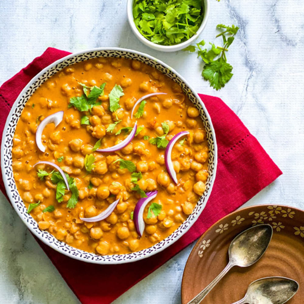 Sukhi's curry dip with naan bread for snacking.