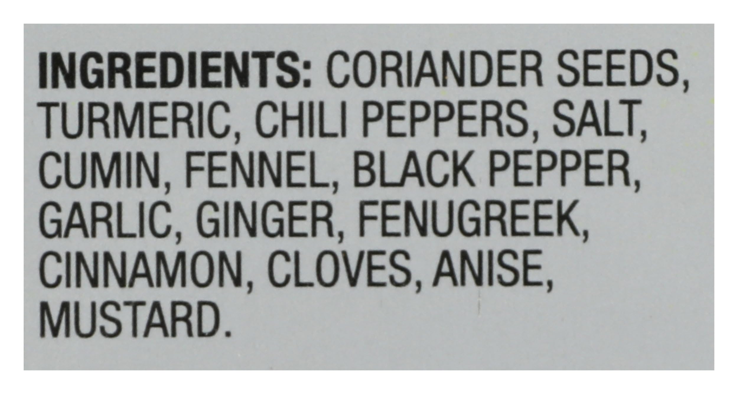 Sun Brand Madras Curry Powder in a sizzling pan enhances vegetables.