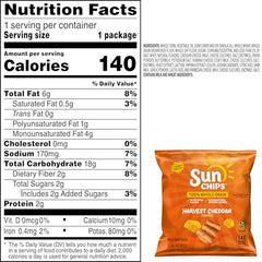 SunChips wave-shaped chips in hand, highlighting crunchy texture