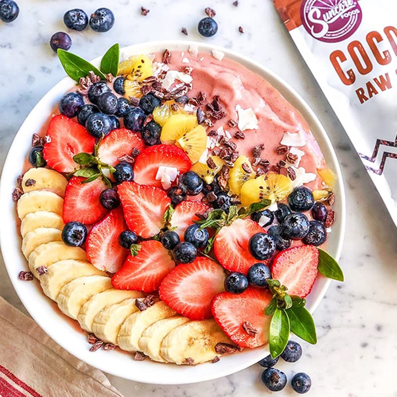 Suncore Foods Organic Cacao Nibs on granola bowl for wholesome crunch
