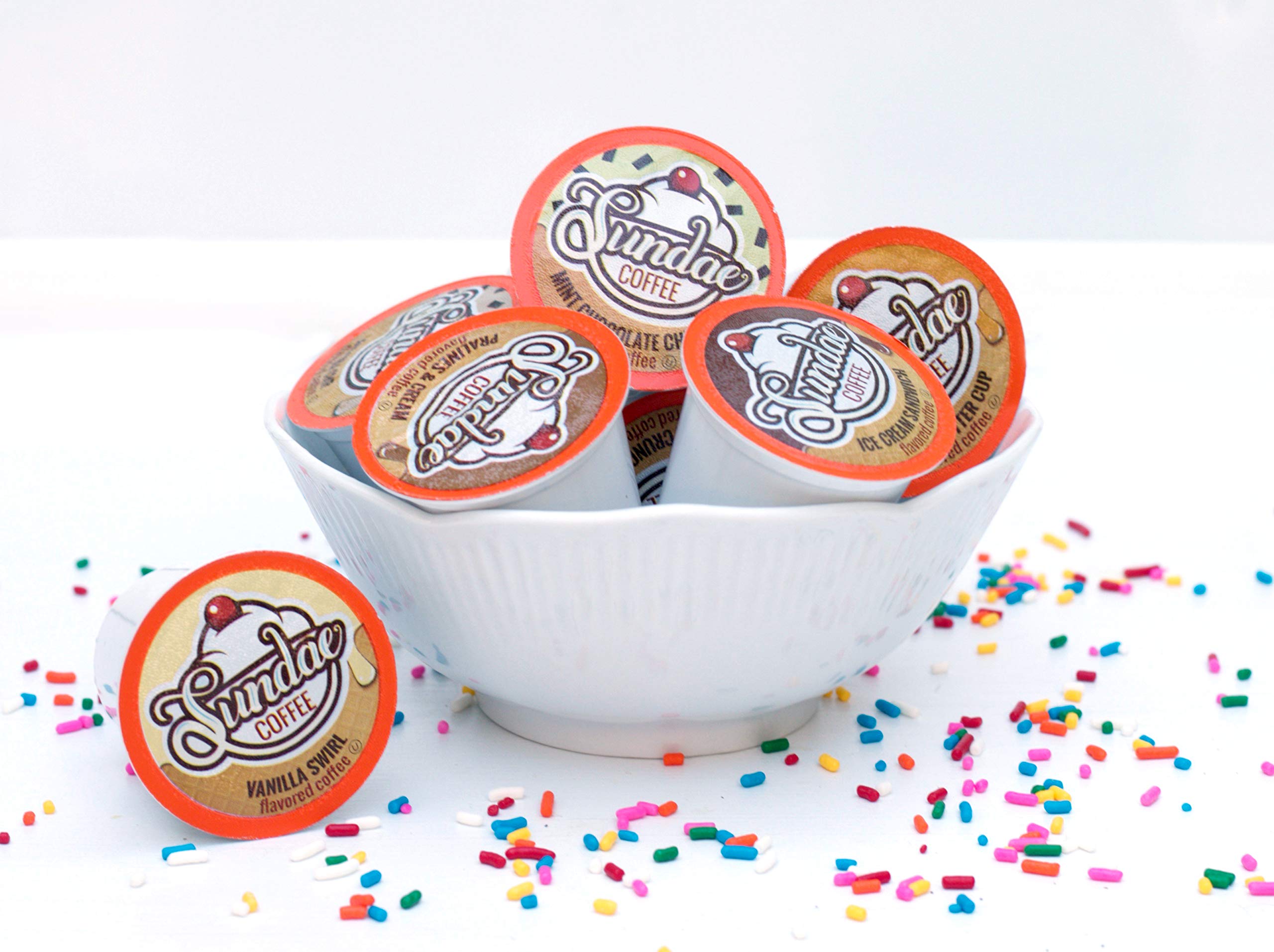 Sundae flavor pods captured as dessert-inspired treats in a cup.