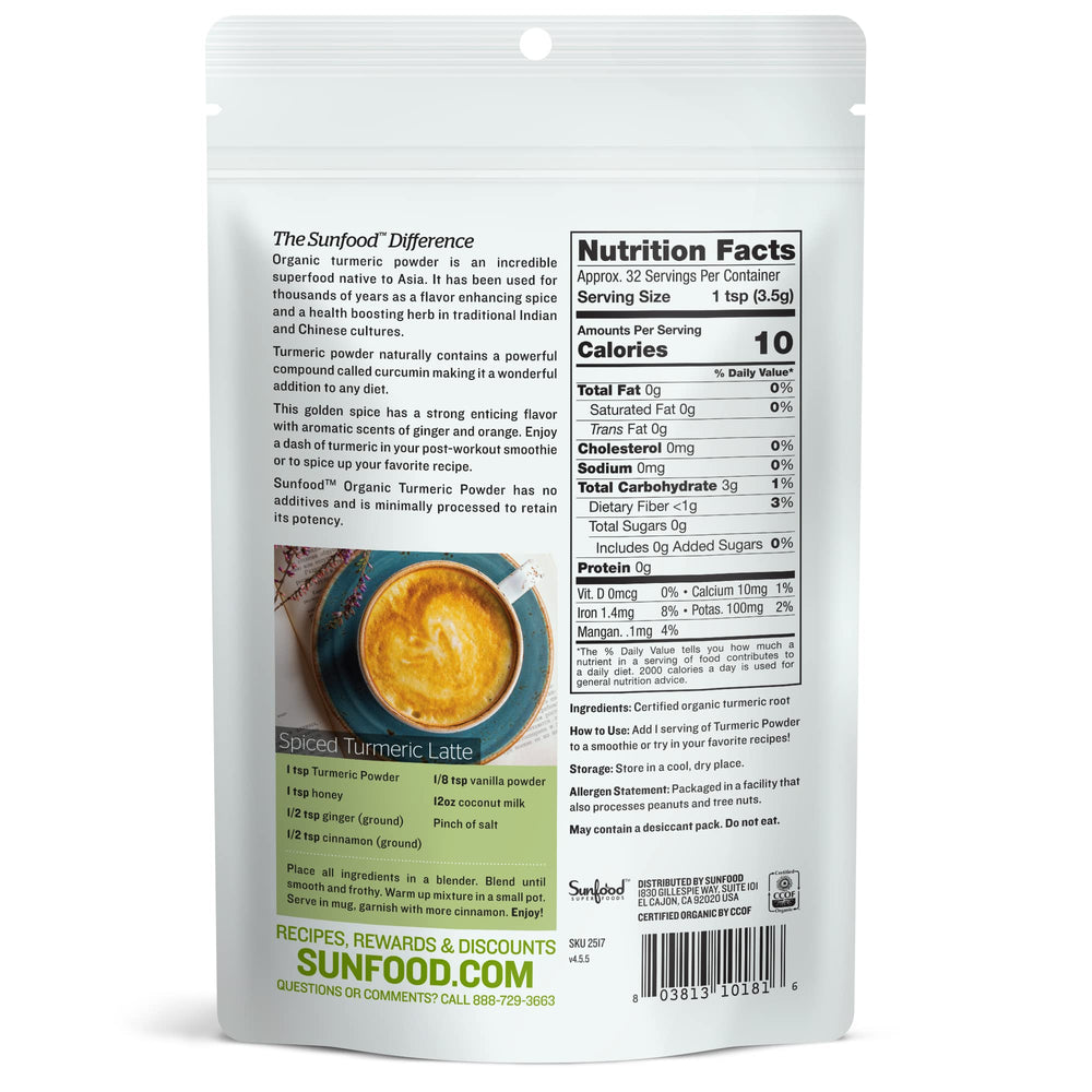 Sunfood Turmeric Powder spoon in a bowl, ready to blend into smoothies.
