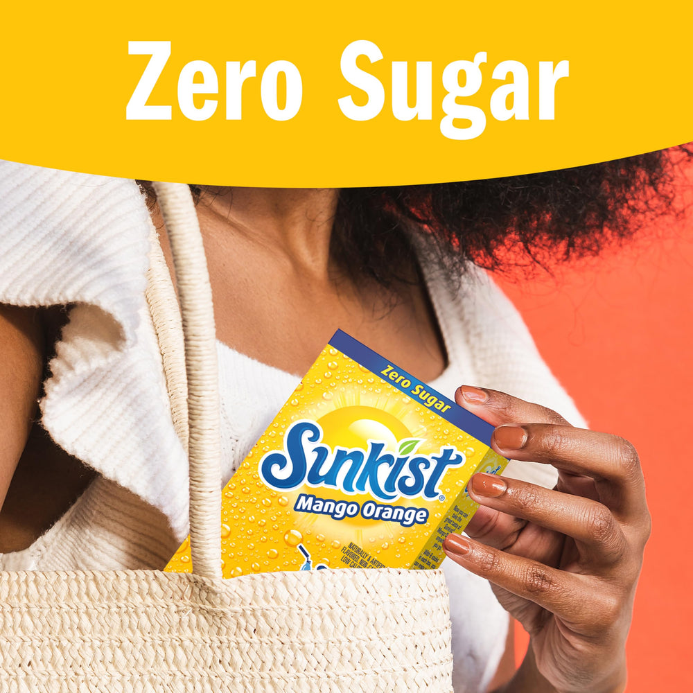 SINGLES TO GO! Sunkist Mango Orange packet poured into water bottle for flavor