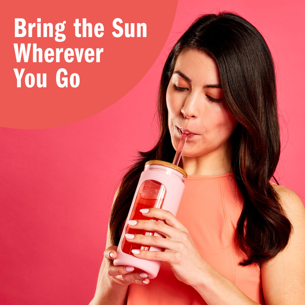 Sunkist Singles to Go stick shown with water bottle highlighting gluten free and caffeine free