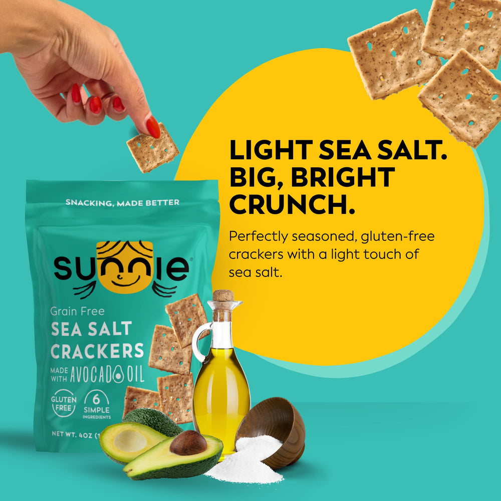 Sunnie avocado oil crackers on cutting board for sharing
