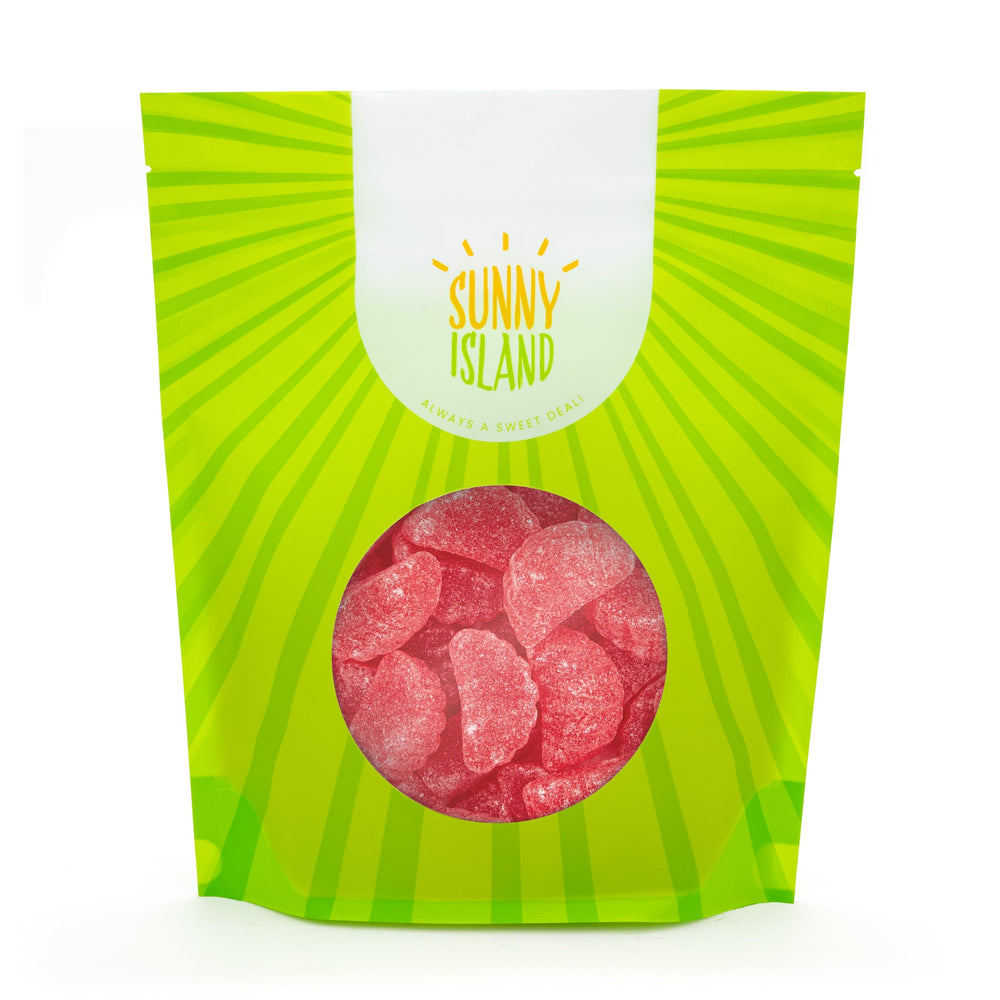 Sunny Island Cherry Slices appear soft and chewy beside a dessert plate.