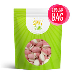 Sunny Island pink gummies at a baby shower candy station.