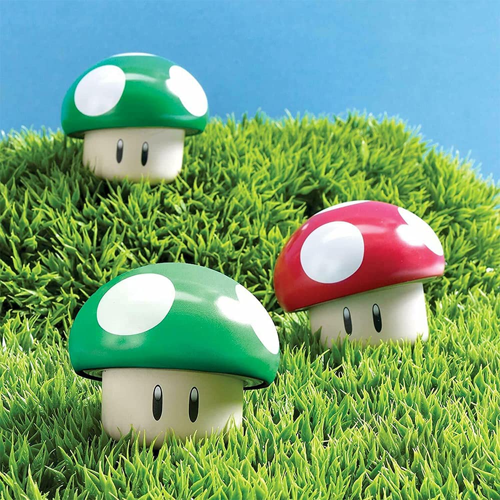Green apple candies inside a green mushroom tin.