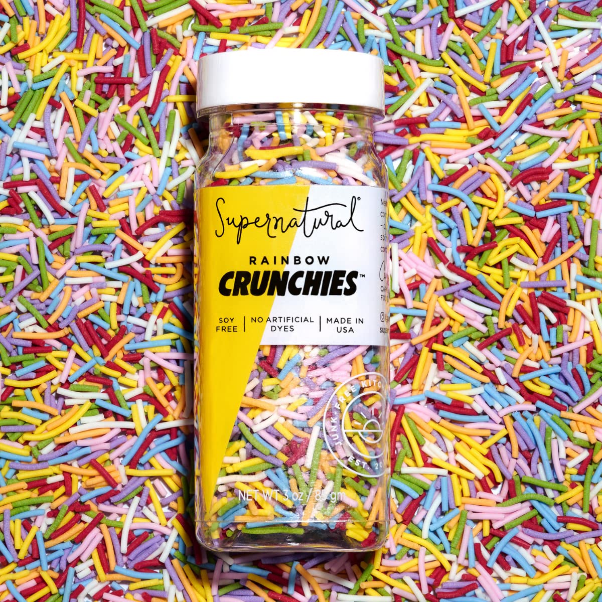 Rainbow Crunchies jar close-up with vibrant plant-based colors for baking