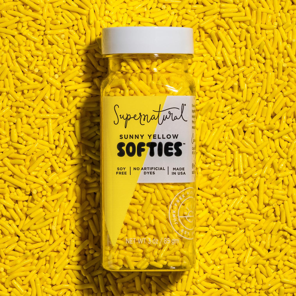 Supernatural Softies Sunny Yellow bottle with dye-free sprinkles boosts vibrant treats.