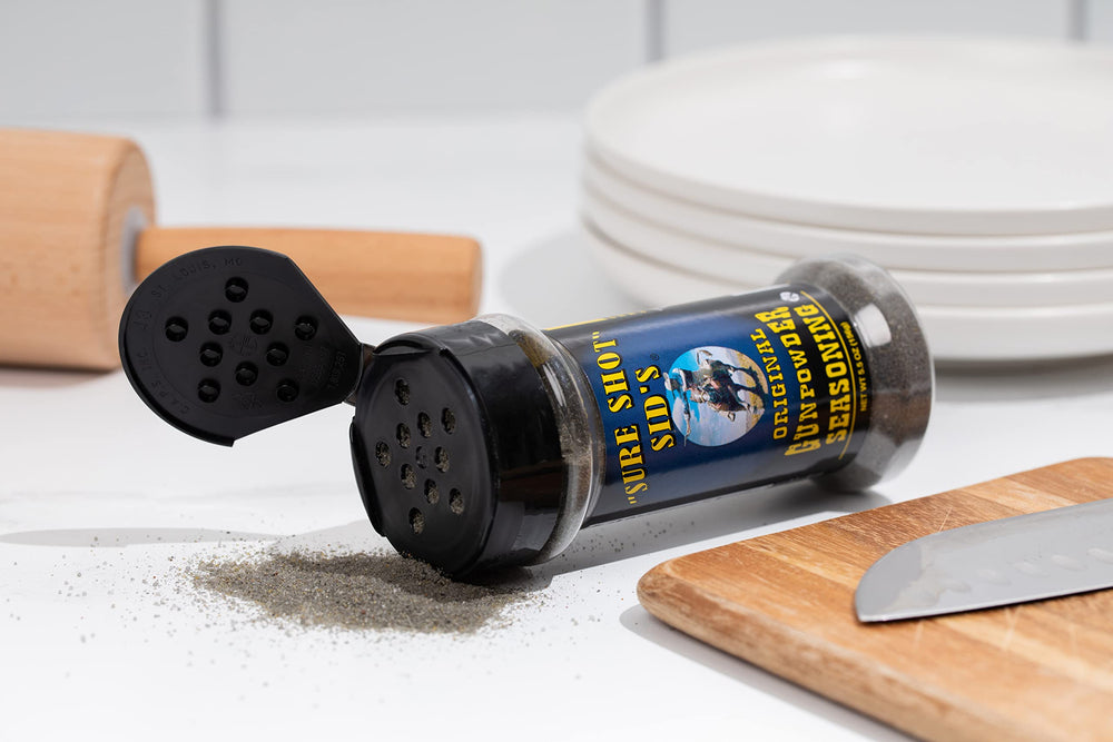 Sure Shot Sid's Gunpowder Seasoning on a rack of ribs.