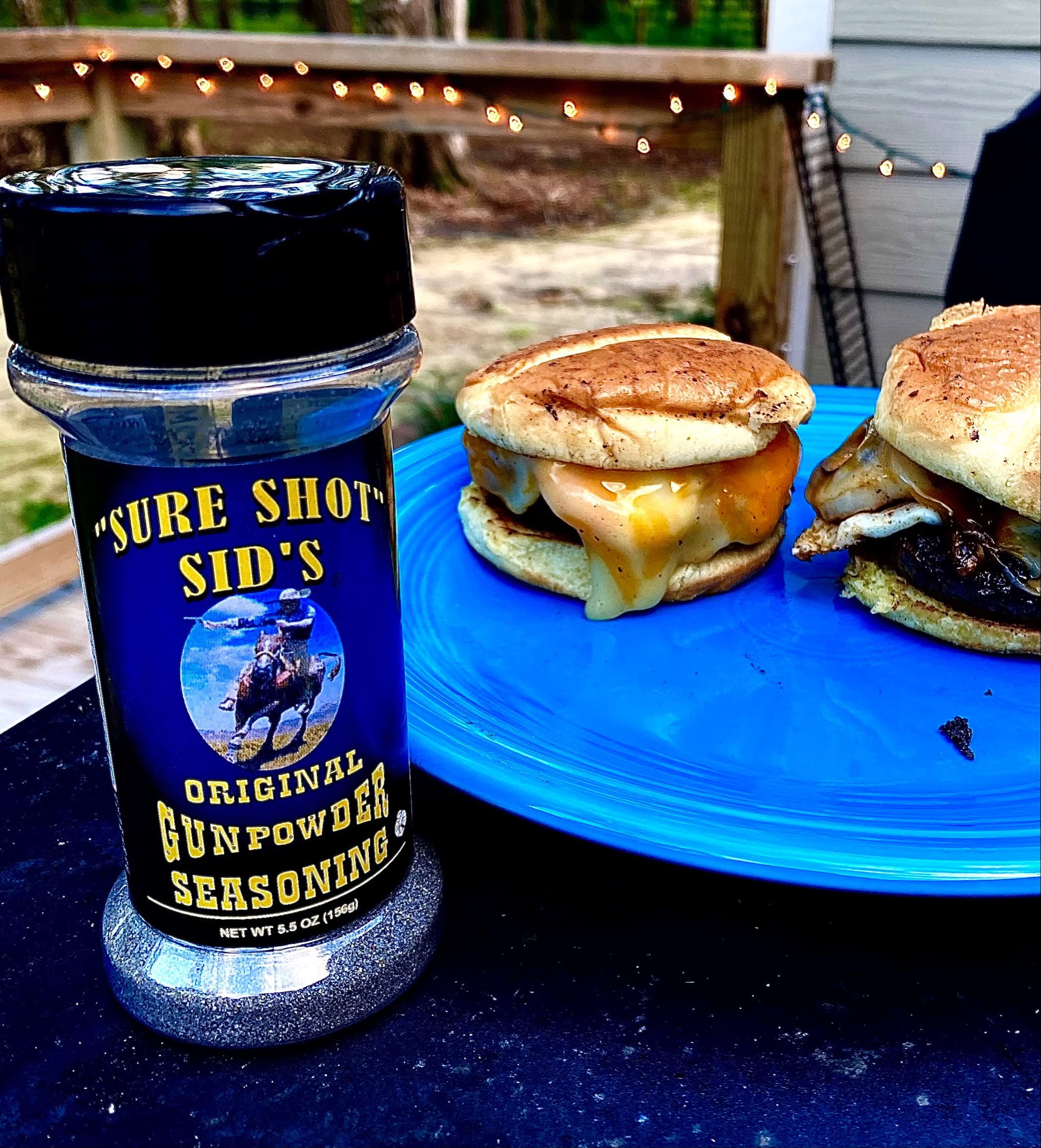 Ribs on grill with Gunpowder seasoning delivering rich aromas.