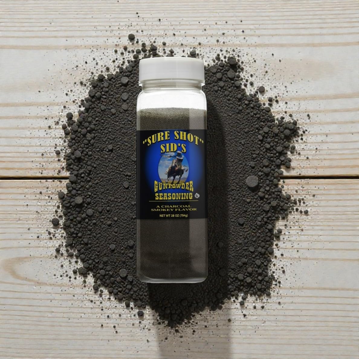 Sure Shot Sid’s Gunpowder Seasoning on pork chops enhances grill aromatics.