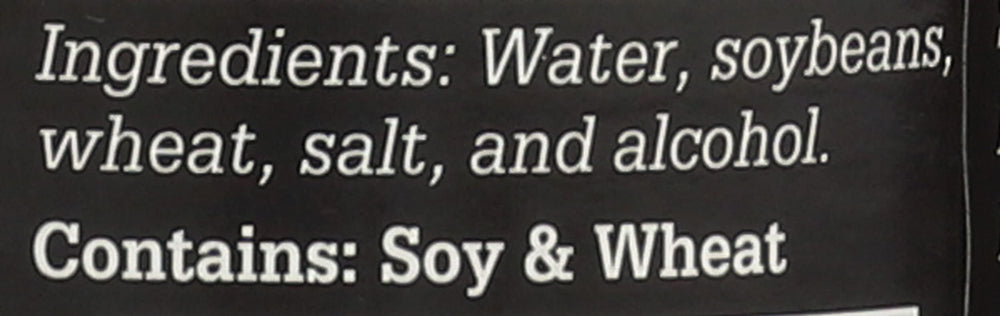 Sushi Chef dark soy sauce on a prep board for sushi rolls and marinating.