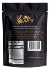 Swag Brewery whiskey jerky close-up bite reveals tender texture and smoky-sweet flavor ideal for trips.