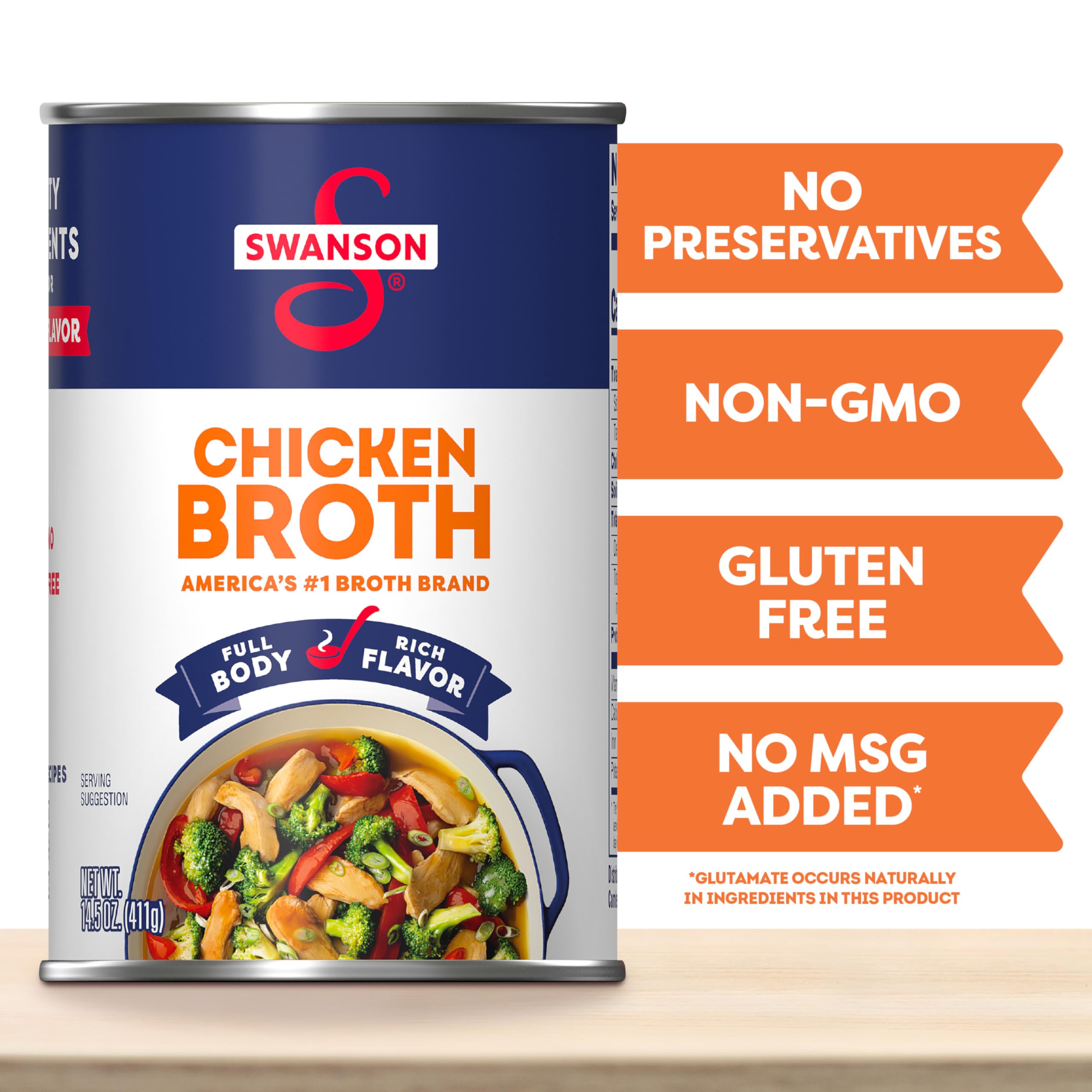 Swanson Chicken Broth being poured into a pot