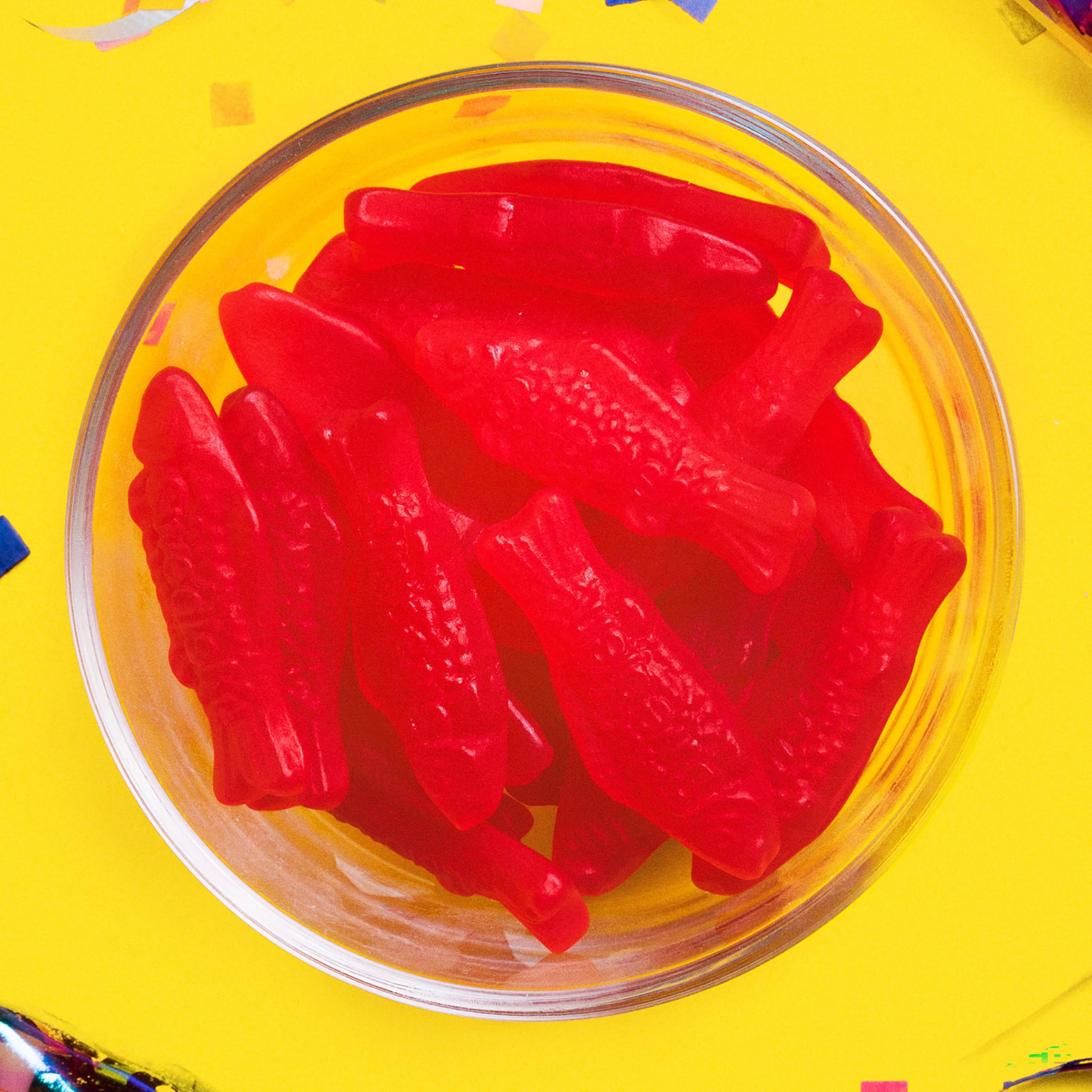 Family enjoying Swedish Fish during snack time at home.