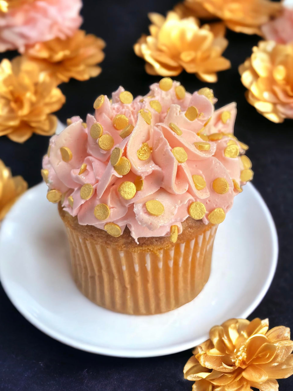 Sweet Eva’s metallic gold confetti sprinkles on cookies create festive sparkle.