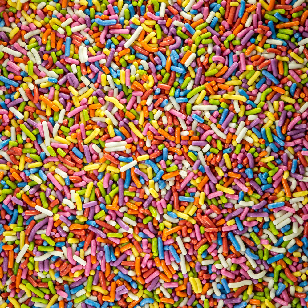 Sweet Eva's Rainbow Sprinkles on cupcakes, adding bright decoration and texture.