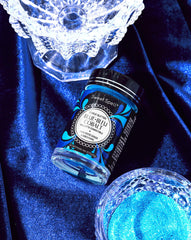 Sweet Spell blue edible glitter dusting on cake creates dazzling sparkle.