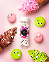 Sweet Spell candy eyeballs serve as cupcake toppers for spooky treats
