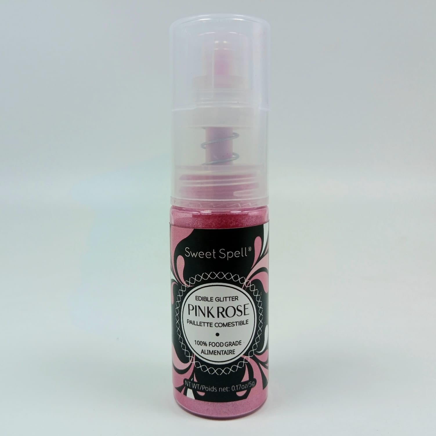 Sweet Spell pink glitter spray on cupcakes for a delicate, edible shimmer