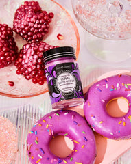 Sweet Spell purple glitter pour creates a sparkling cocktail finish