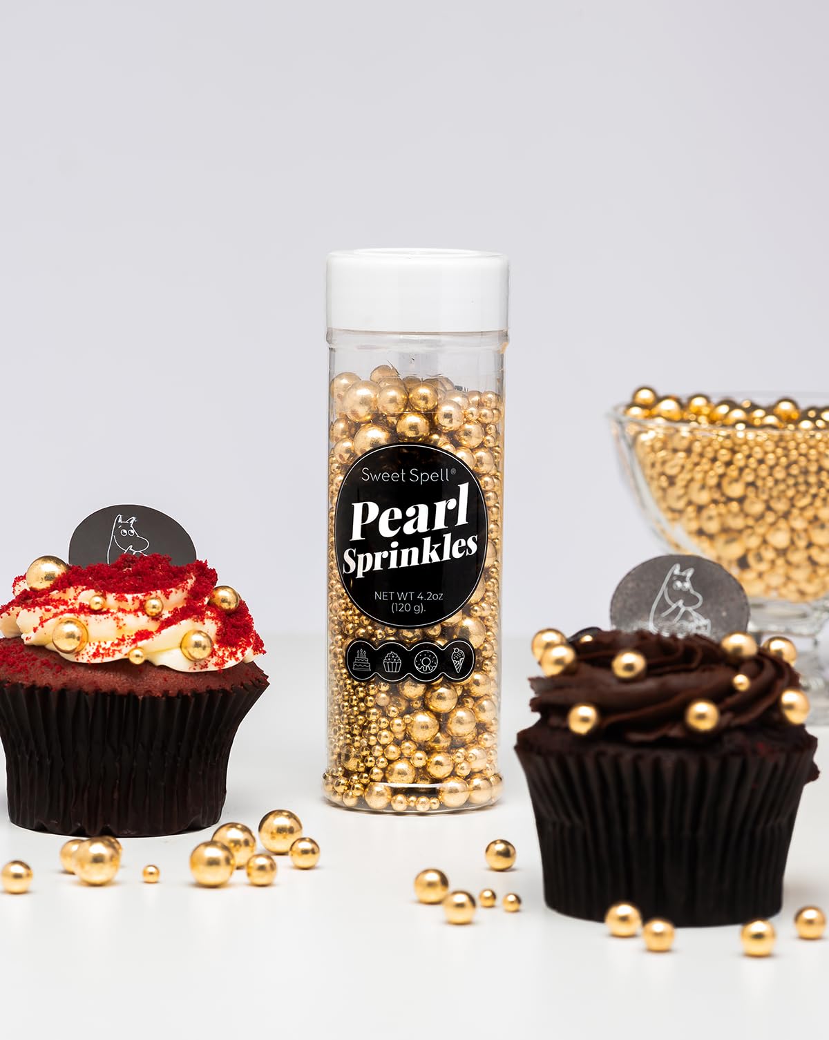 Sweet Spell pearl sprinkles on cupcakes add radiant color and sophistication.