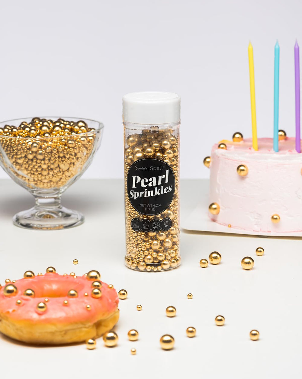 Sweet Spell gold and silver pearls atop ice cream for a glossy sparkle.