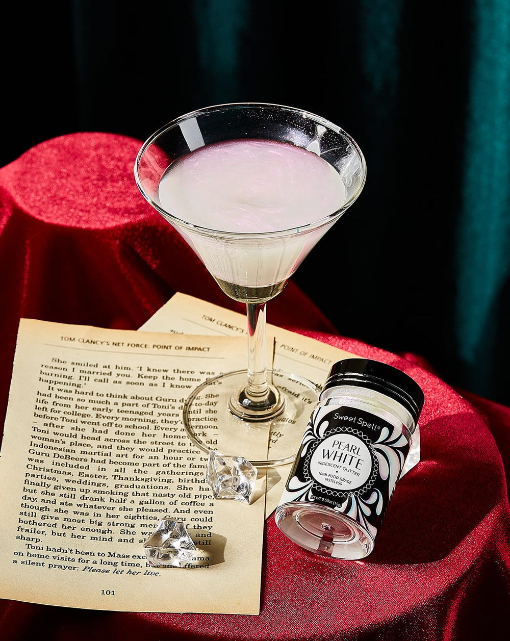 Sweet Spell iridescent pearl glitter enhances cocktails with shimmering appeal.