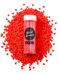 Sweet Spell red heart sprinkles on cake for festive decoration.