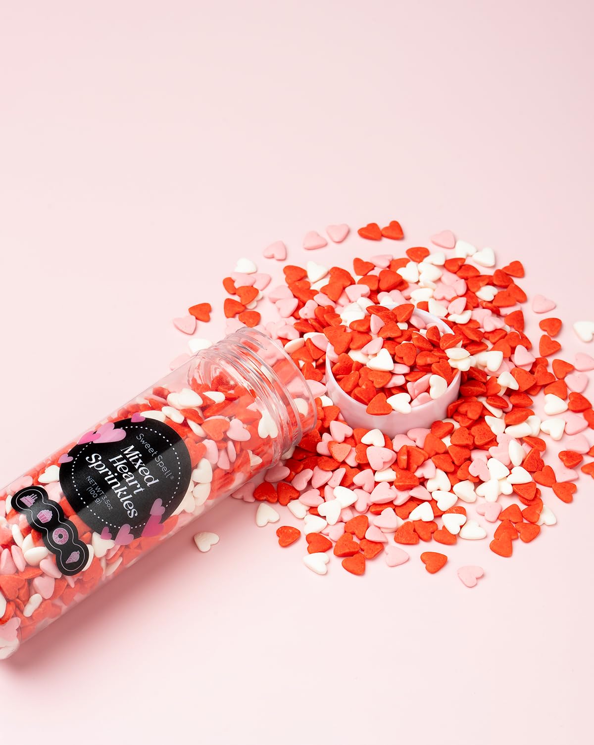 Sweet Spell resealable container keeps heart sprinkles fresh for celebrations.