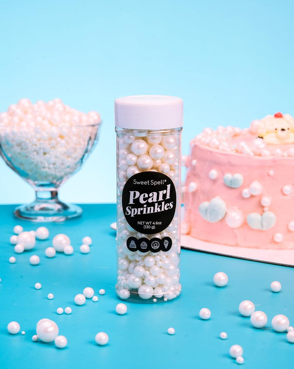 Close-up of Sweet Spell White Pearl Sprinkles highlighting radiant sheen.