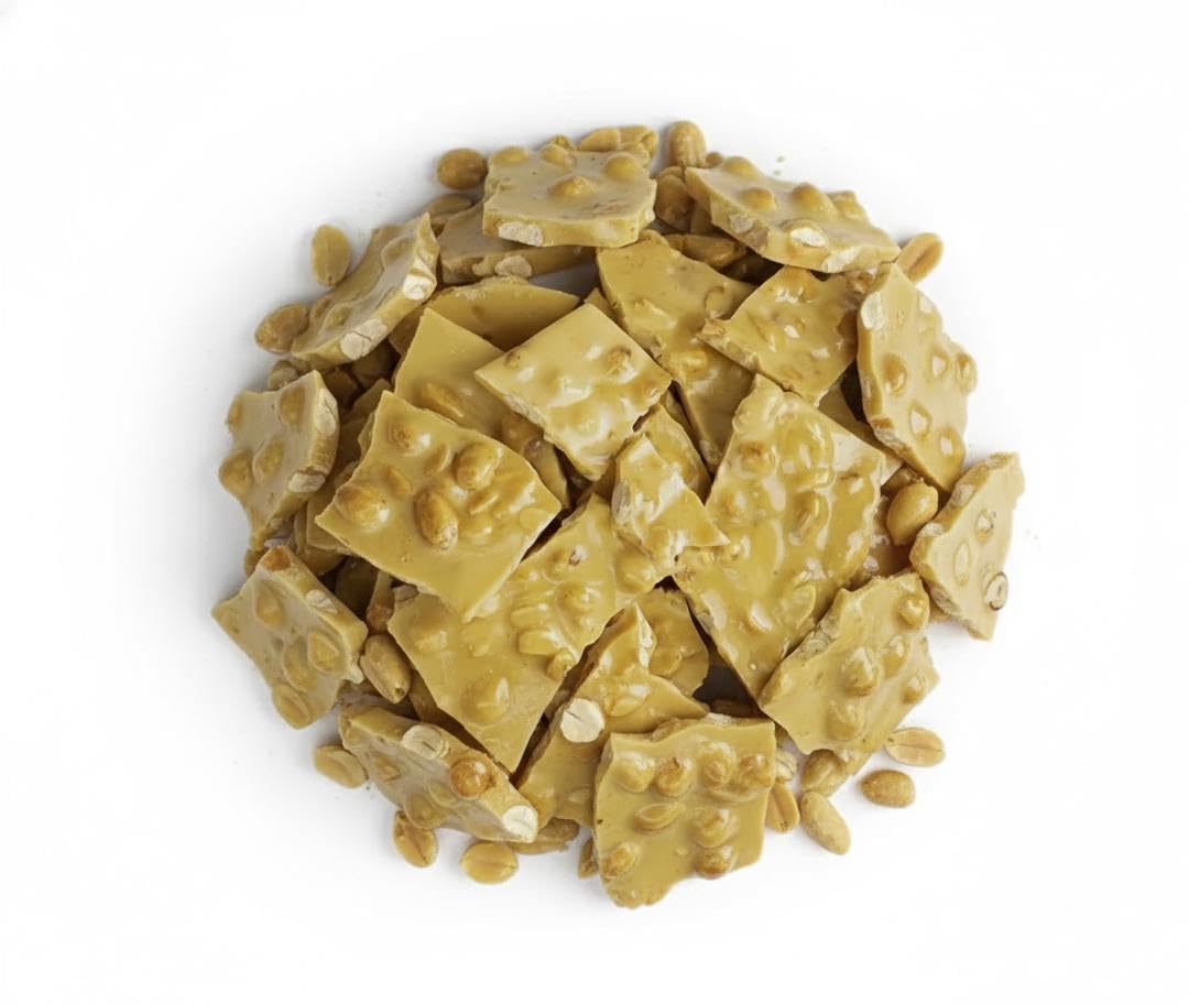 SweetGlob Old Fashioned Peanut Brittle close-up shows roasted peanuts for a crunchy snack.