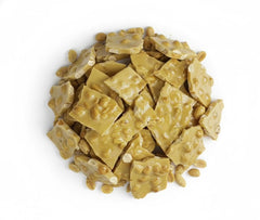 SweetGlob Old Fashioned Peanut Brittle close-up shows roasted peanuts for a crunchy snack.